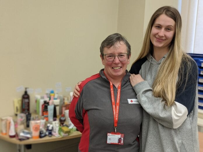 Ruth Allen, ERV - Team leader and Paris Peacock, local resident affected by flooding at the rest centre 2