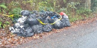 More than 100 black bags collected from fly-tipping incident