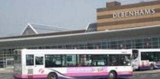 Free vaccine shuttle bus has new stop