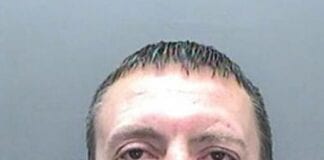 Hammer attack burglar who was caught sleeping by police jailed