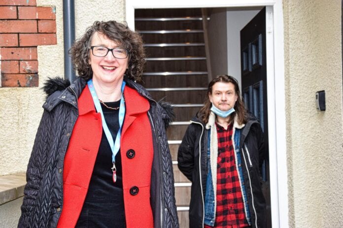 Marcia Sinfield and a tenant at the new housing