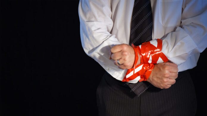 drowning-and-waving-red-tape-is-stragnling-business-1024x576