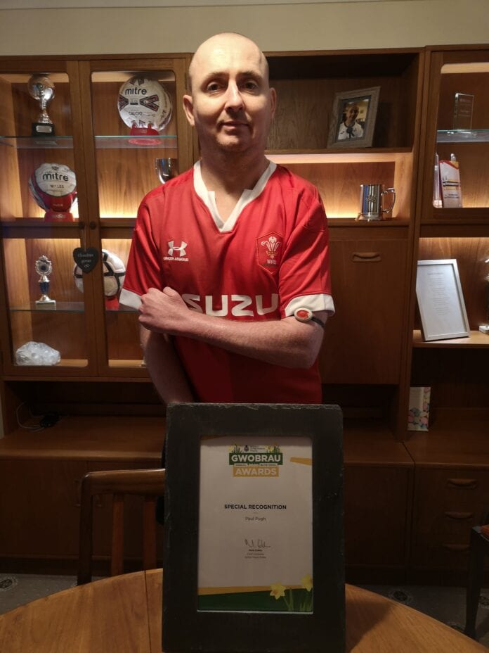 paul-with-award-2