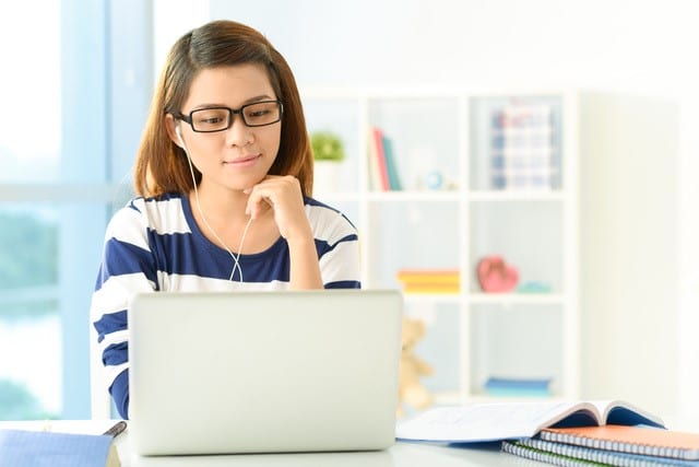 Stock photo of student at computer