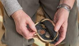 Conservative-led councils in England more likely to slash financial support for people on low incomes, study shows
