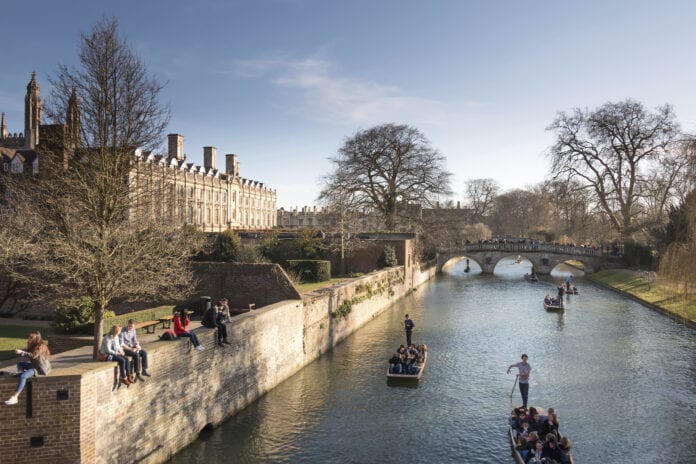 Cambridge, UK -- Mar 7, 2015: Weekend Relaxing Punting Scene in
