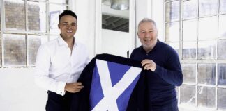 Jermaine Jenas Stitched Up By Scottish Rival Ally McCoist To Unknowingly Model A Suit With An Emblazoned Saltire On The Back