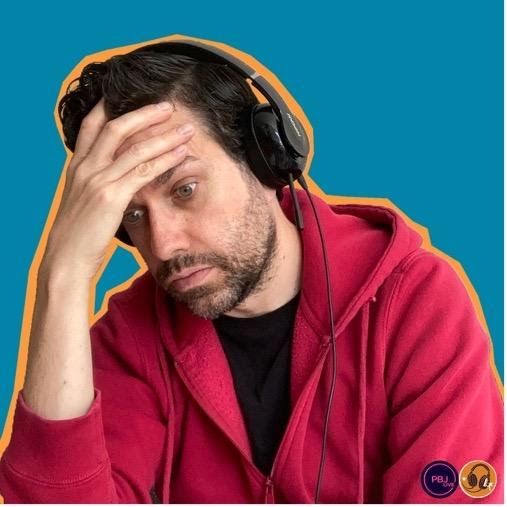 A person wearing headphones
Description automatically generated with medium confidence