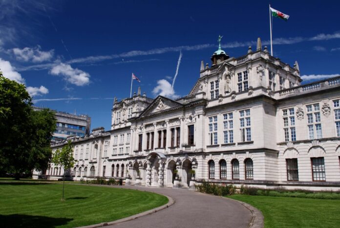 Main-Building_BlueSky_GreenGrass-min-scaled-1
