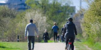 Why has cycling become more popular in the UK?
