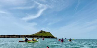 Former Welsh rugby international leads team on epic £50,000 ‘Paddle, Peak and Pedal’ charity fundraising challenge