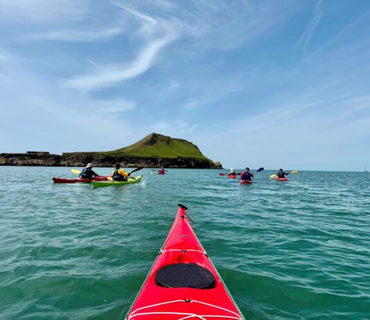 Former Welsh rugby international leads team on epic £50,000 ‘Paddle, Peak and Pedal’ charity fundraising challenge