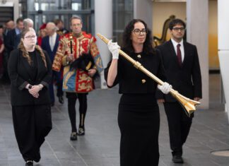 Senedd opening: Former tour guide Delyth Lewis leads King and Queen as mace bearer